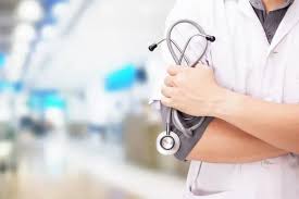 Doctor with stethoscope in hospital